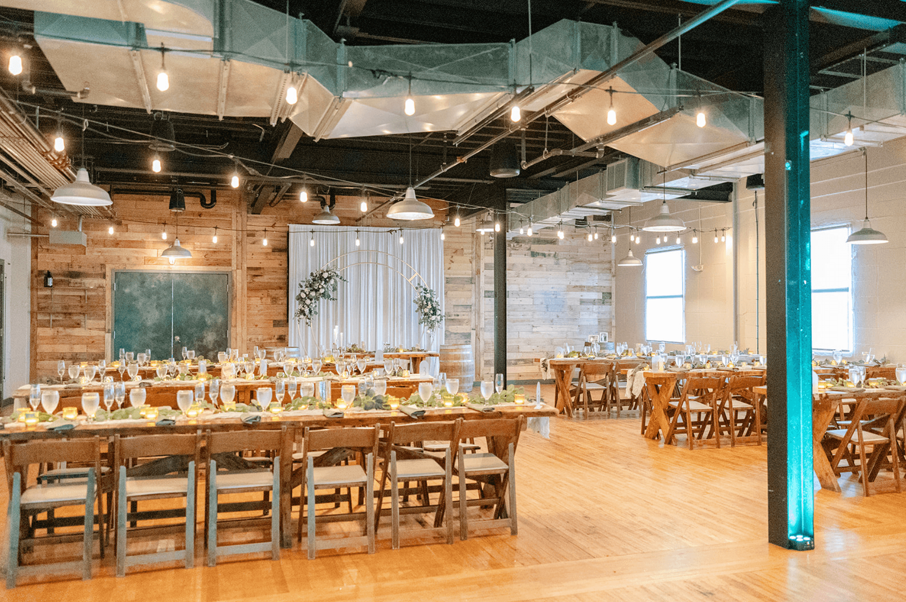 Wedding floral centerpieces at Beach Haus Brewery